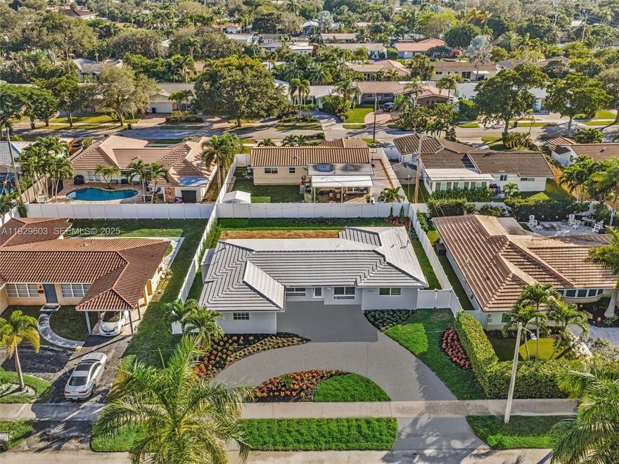 Impeccable residence at the exclusive area of Imperial Point. Natural daylight bathes this 3BED/2BA home with uniform porcelain tile throughout. Cashmere bespoke cabinets in kitchen and bathrooms. All new appliances. Impact windows and sliding doors.. Spacious back patio, with plenty room for entertainment, offers tranquil settings with heated pool and new landscaping. one car garage. Perfectly located next to wonderful schools, shops restaurants and airport. Minutes to beaches. AS-IS.