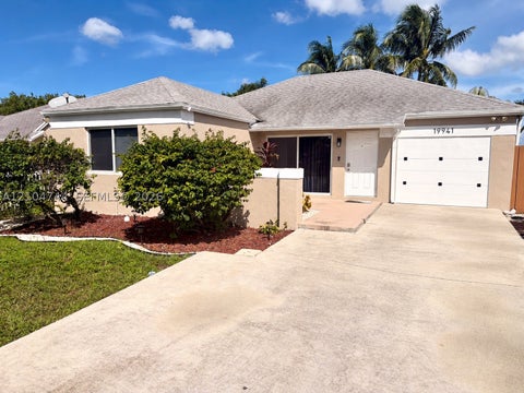 Photo of 19941 NW 32nd Ave, Miami Gardens, FL 33056 (MLS # A12104744)