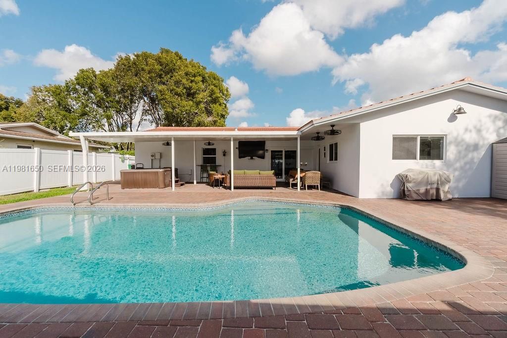 Photo of 1710 NW 106th Ter, Pembroke Pines, FL 33026 (MLS # A11981650)