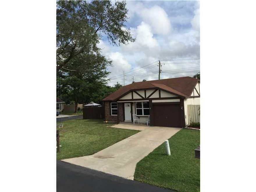 TOTALLY REMODELED FROM TOP TO BOTTOM, WITH IMPACT WINDOWS, GRANITE COUNTER ON KITCHEN, STAINLESS STEEL SAMSUNG APPLIANCES. TITLE THROUGHOUT, ALL TRIMS, HARDWARE, 6 PANELS STYLE DOORS, KNOCK DOWN WALLS, SMOOTH CEILINGS. MASTER BATH WITH GRANITE SHOWER,GUES T BATH WITH MARBLE. NICE FENCED CORNER LOT WITH BRICK PAVERS ON SIDE YARD AND LED 200 WATTS PATIO REMOTE CONTROLLED LIGHTS. GARAGE CONVERTED IN TO A PLAY ROOM. NEWER ROOF. STORAGE ROOM ON GARAGE. NEW A/C TRANE 16 SEER WITH 9 YEARS WARRANTY. CALL AGENT