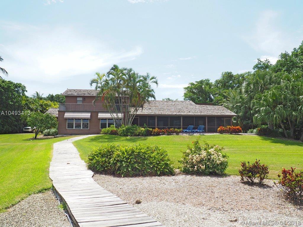 BEST BUY FOR JUPITER ISLAND DIRECT INTRACOASTAL!!! Nice dock with no fixed bridges. The property includes a cozy/comfortable home.....but the property is prime to build new. Located at the south end of the Town of Jupiter Island, with very easy access to the airport, shopping, dining....and the BEACH !! Call to set your appointment !!