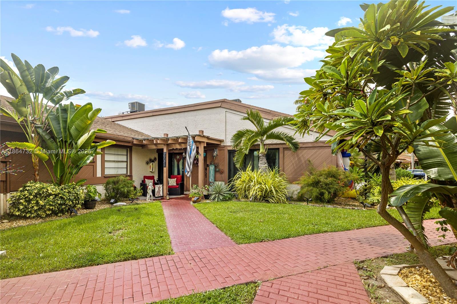 LOCATION! LOCATION! Harbourwood corner Villa, 42 ft assigned boat dock included, Ocean access, no fixed bridges. Open and Spacious 3 Bedroom, 2 Bath, split floor plan, 1626 sq. ft. Vaulted ceilings with exposed wood beams, skylight & ceramic tile plank flooring. Master bath has a separate jacuzzi tub and shower. Lots of storage space. Kitchen features granite countertops & bar seating area. SS appliances, new refrigerator Fenced in private patio to enjoy outside dining. New Hurricane impact windows and doors, a newer a/c (2024), new electrical fuse box (2021), new washer & dryer and new roof. Minutes to the Beach, Aventura Mall, Gulfstream Village and Ft. Lauderdale Airport.