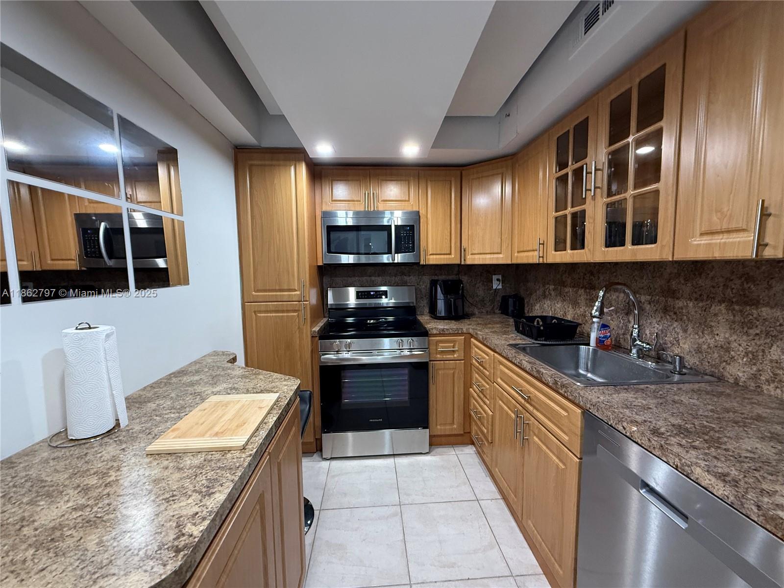 Seasonal condo available across from the beach with resort-style amenities. The building offers tennis courts, a marina, BBQ area, valet parking, shuffleboard courts, golf putting green, swing practice box, fitness center, and a large community pool. On-site conveniences include stores, a snack bar, and restaurants. The unit includes one assigned parking space.