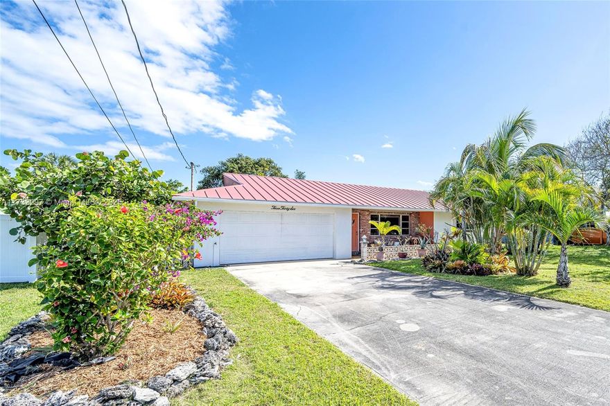 Location! Enjoy all the amenities of Island life, 2 blocks from the beach, fishing & eateries. This well-maintained home offers the perfect blend of comfort and potential. A welcoming front porch and back patio overlooking lush irrigated gardens w/ avocado & papaya -truly a taste of tropical paradise! The large lot offers room for a pool, boat, & expansion to create your dream coastal retreat. Inside, you'll find a spacious layout with private garden and plenty of room to relax and entertain. Close to parks, boat ramps & a vibrant array of island amenities. Enjoy kayaking the Indian River Lagoon for dolphin and manatee sightings. This property is ideal as a 2nd home or income generating short-term rental in a thriving rental market w/high demand. No HOA. See 3D virtual tour for details.