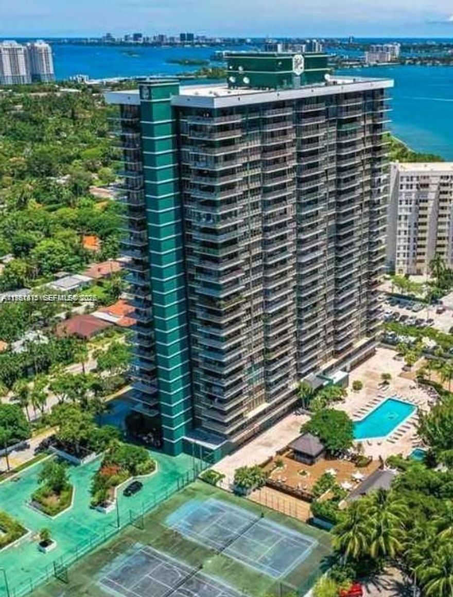 Welcome to Residence 2201, a rare opportunity to acquire the building's coveted "01" line. This spectacular high-floor corner unit offers breathtaking views of Biscayne Bay, the ocean, and the Miami skyline. Flooded with natural light and featuring an expansive wrap-around balcony, the layout is perfect for sophisticated living and entertaining. This offering is more than a luxury residence; it is a highly strategic investment with tremendous built-in upside. The building is currently undergoing its 40-year recertification, along with extensive modernizations to the common areas. With the exterior work on the 01 line scheduled to be completed in the next 4 to 6 months, an astute buyer has the unique advantage of securing this premium unit at a highly attractive price point today. Historically in the Miami market, completed recertifications and modernized amenities trigger a significant surge in building valuations. Acquiring this property now allows you to purchase under market value and capture substantial immediate equity upon the project's completion. Nestled in the heart of the Upper East Side and the historic MiMo District, you are investing in one of Miami's most dynamic, centrally located, and rapidly appreciating neighborhoods. The immediate area is flourishing with new restaurants, chic bars, and boutique cafes. Seize the opportunity to invest in a trophy property where world-class views meet exceptional financial potential. Schedule your private showing today.