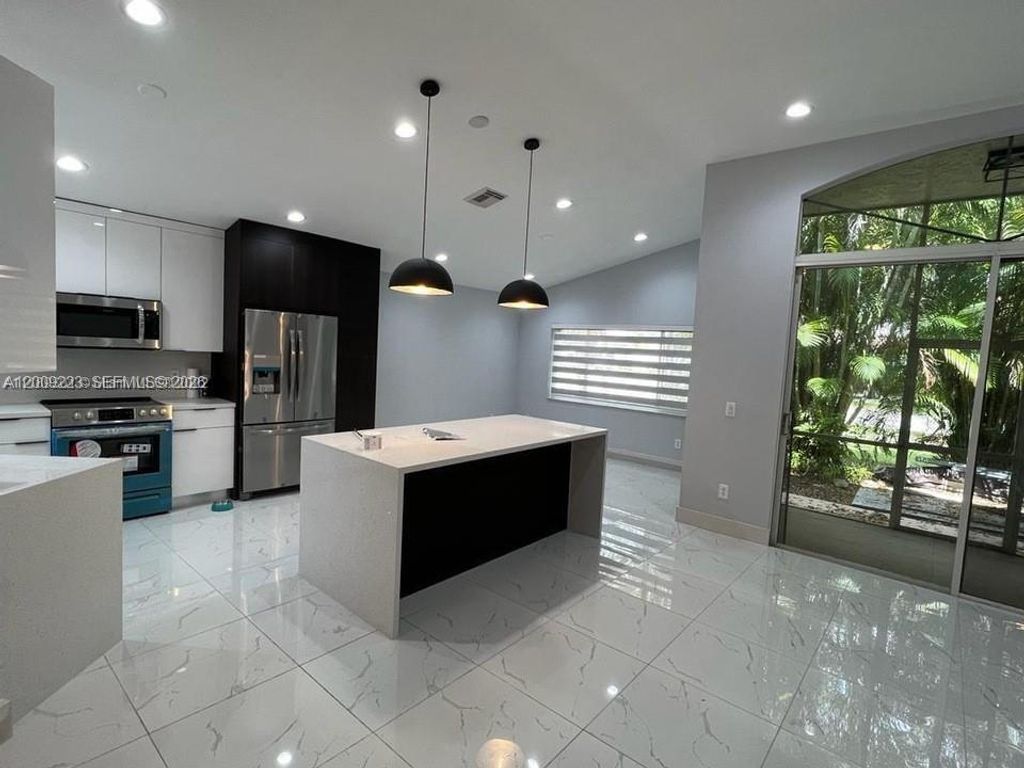 Photo of 1970 NW 178th Ter, Pembroke Pines, FL 33029 (MLS # A12009223)