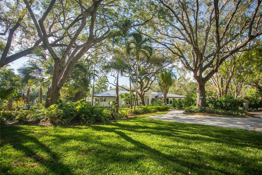 Nestled in a magical setting on a special cul-de-sac filled with grand oak trees and awe-inspiring green areas. Magazine quality one story modern home where every detail has been carefully selected. Just completed total renovation with large open entertaining spaces, two family rooms, walls of glass to beautiful grounds, large outdoor patio, pool and tennis court. The heart of the home centers around a dramatic DCOTA kitchen by Neff with all the special equipment and finishes to delight everyone.