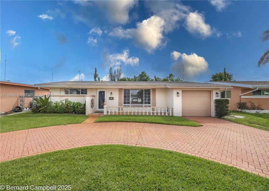 This well-maintained 2-beds/2-baths home also includes a versatile third room, perfect as an additional bedroom, office, or den. Featuring a spacious split floor plan, the home boasts elegant porcelain tile throughout the main areas & warm wood flooring in the bedrooms. Nestled on a quiet, peaceful street, this property offers partial hurricane-impact windows & door for added security & peace of mind. A one-car garage includes a washer & dryer for your convenience. Recent updates include a newer roof, A/C, & electrical panel. Spacious screan in patio at the rear section of the home ideal for entertaing. Enjoy a lush backyard with beautiful fruit trees—ideal for relaxing or entertaining. Conveniently located close to major highways, shopping centers, & daily necessities. No age restrictions