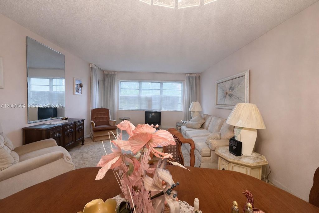 Photo of 410 SE 2nd St #305, Hallandale Beach, FL 33009 (MLS # A12000554)