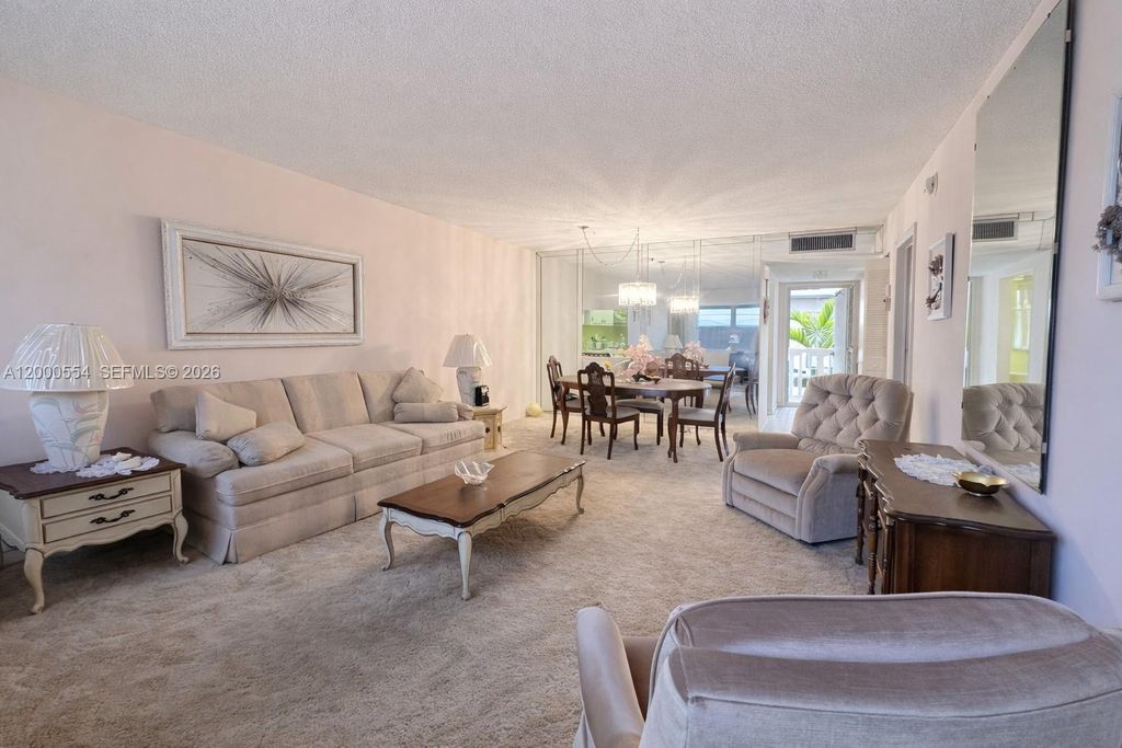 Photo of 410 SE 2nd St #305, Hallandale Beach, FL 33009 (MLS # A12000554)