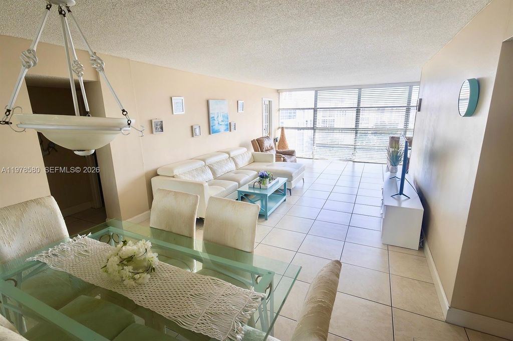 Photo of 801 Three Islands Blvd #520, Hallandale Beach, FL 33009 (MLS # A11978580)