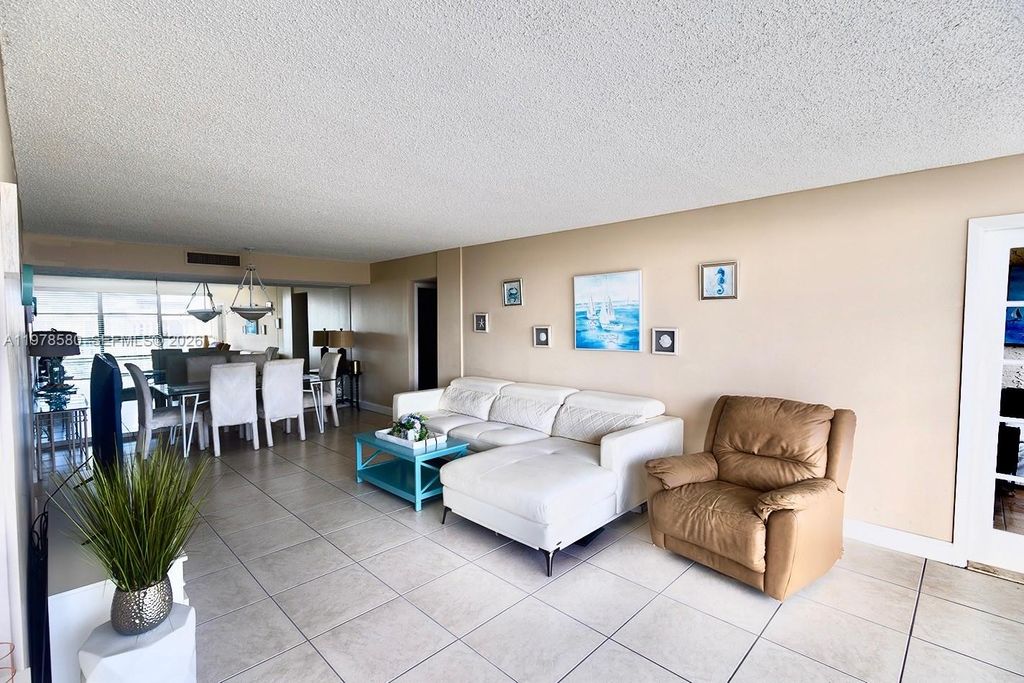 Photo of 801 Three Islands Blvd #520, Hallandale Beach, FL 33009 (MLS # A11978580)