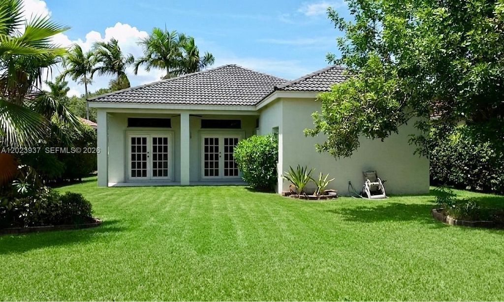 Photo of 953 Tanglewood Cir #953, Weston, FL 33327 (MLS # A12023937)