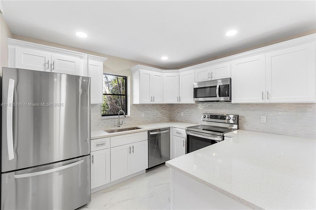 Photo of 7744 W Courtyard Run W, Boca Raton, FL 33433 (MLS # A11835705)