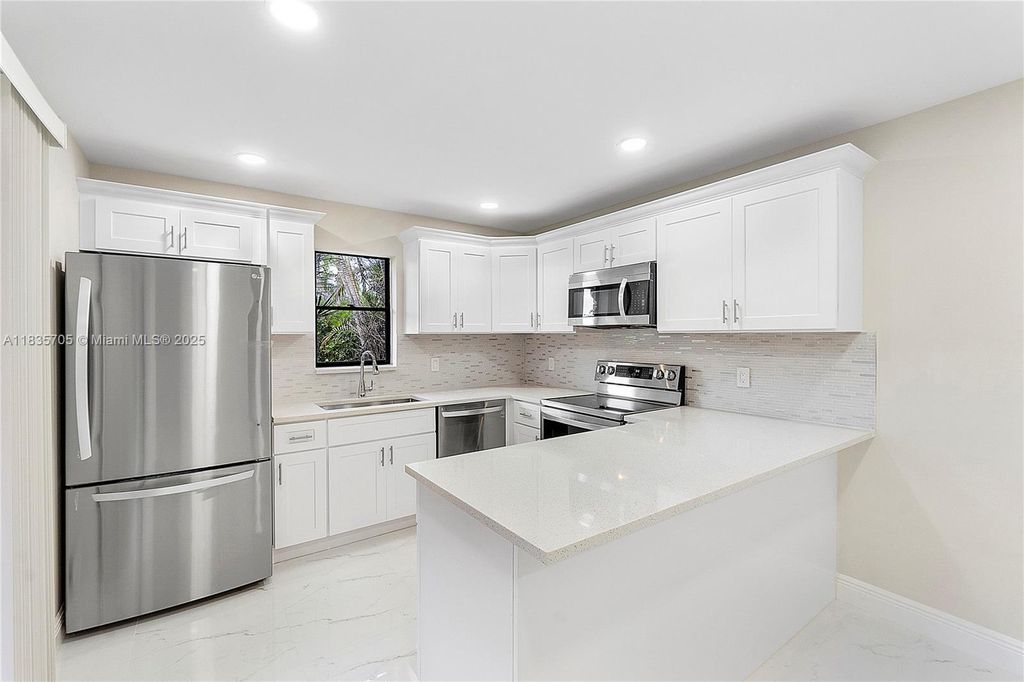 Photo of 7744 W Courtyard Run W, Boca Raton, FL 33433 (MLS # A11835705)