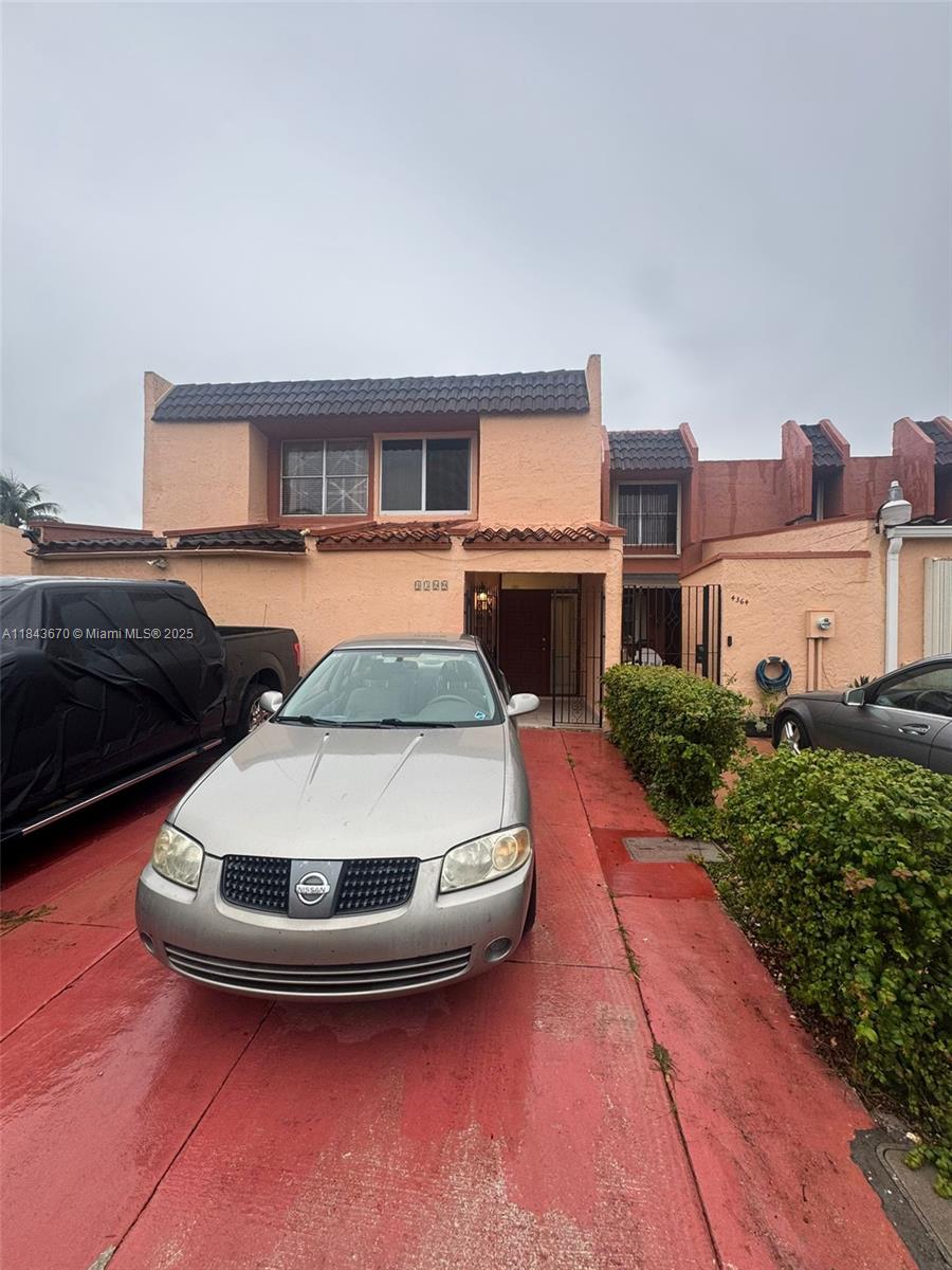 Spacious townhouse located in the desirable West Hialeah area. This 2-bedroom, 3-bath home features a comfortable living and dining area, a functional kitchen, and in-unit washer and dryer for added convenience. Both bedrooms are generously sized, and each has access to a full bathroom. The property offers private parking for two vehicles and is situated in a quiet, residential community close to schools, shopping, and major highways. Perfect for families or investors!