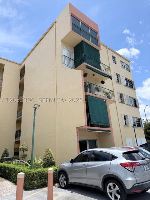 Photo of 1975 W 44th Pl #401, Hialeah, FL 33012 (MLS # A12033306)
