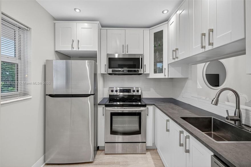 Beautifully Updated 1-Bedroom, 1-Bath Condo in Hawaiian Gardens – Tulip Building. Move right in to this fully furnished, turnkey unit in the desirable Phase 3 of Hawaiian Gardens! This charming top-floor condo features a beautifully remodeled kitchen with white cabinetry, tile flooring throughout, and tasteful finishes. Enjoy tranquil water views from your bright and airy Florida Room—perfect for relaxing any time of day. Located in a well-maintained, HOPA-verified 55+ community offering two scenic lakes, a sparkling pool, shuffleboard, and a full calendar of social activities. Wow, Don't miss it!