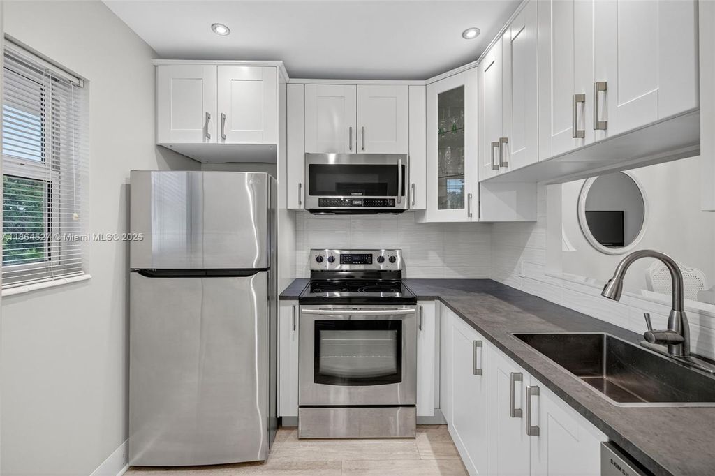 Photo of 5001 NW 34th St #304, Lauderdale Lakes, FL 33319 (MLS # A11864527)