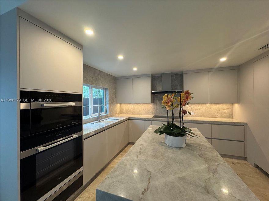 PROFESSIONAL PHOTOS WILL BE UPLOADED MAY 15, 2026. Move-In Ready Home! 9 minute walk or 2 minute drive to Ransom. NOT LOCATED IN A FLOOD ZONE. Hurricane impact windows and doors all throughout the home. House is 2001 built. Live in Coconut Grove's most sought after street - Tigertail. Corner lot on Tigertail & Washington St. walking distance to Cipriani coffee shop at Mr. C Residences, pilates, Emissary, Sardelle's, Kennedy park, Starbucks, marina, upscale gym's & fitness classes & the most prestigious public & private schools Miami has to offer. It checks all your boxes: 4 large en-suite bedrooms, 4 full bathrooms, 1 den/office space, 2 garages that actually fit cars, room to park additional 3-4 cars behind your private gate, & swale parking fits 6 cars. This house has a very well thought out layout/floor plan with no odd additions. Brand new in home infrared red sauna & hot sauna combo directly in your master bathroom where you can break a sweat & hop into your oversized shower or free standing tub. Kitchen is brand new European style kitchen, Miele appliances all paneled. Brand new European style bar underneath the stairs. European style closets all throughout the home. Bedroom/bathroom on first floor. Balconies in each bedroom. Amazing outdoor space with terrace, gazebo, & pool. ALL BUYERS MUST SHOW PROOF OF FUNDS OR PRE-APPROVAL LETTER TO SEE THE HOME, NO EXCEPTIONS. HOME RENOVATION COMPLETES ON APRIL 10, 2026.