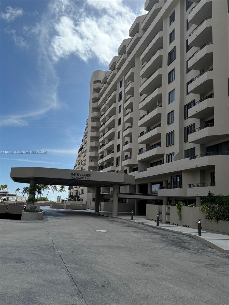 Completely remodeled 1 bed 1 and half bath with large ceramic tiles throughout with high ceiling this gem of an apartment has it all. Partially open kitchen concept with all Bosch appliances flows perfectly into a dinning / living area that is tastefully furnished with modern furniture. Unit is equipped with Bosch washer and dryer and plenty of storage space throughout. Large master bedroom with Ocean views is complimented with custom closet and a completely remodeled bathroom. Also, unit offers an balcony with ocean views perfect for relaxing entertaining. A must see, a truly turn key masterpiece.