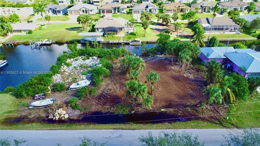 NAVIGABLE, SAILBOAT ACCESS WATER!! Situated on the Kostek Canal to Alligator Creek with direct access to Charlotte Harbor. Approximately 2.5 miles to Harbor. Deep water for heavy craft and Sailboats. Not located in City Limits therefore no deed restrictions, no HOA and no CDD fees but all the amenities of water front living in Punta Gorda!Prime residential lot build your dream home on this Sail Boat Property! Spacious lot offers the perfect opportunity to design and build the home of your dreams. Located in a serene neighborhood with close proximity to all the amenities Southwest Florida has for those seeking a peaceful yet convenient lifestyle. Location it is only a 10 minute ride to Charlotte Harbor, less than an hour to Pass and the Gulf.
