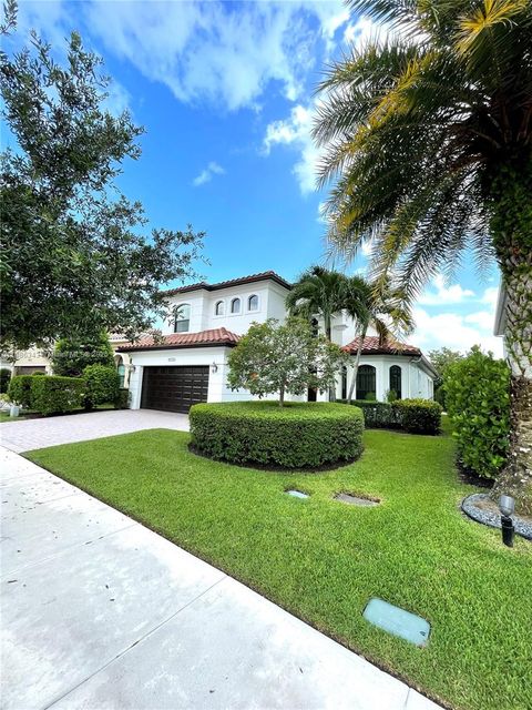 Photo of 10350 Cameilla St, Parkland, FL 33076 (MLS # A11886343)