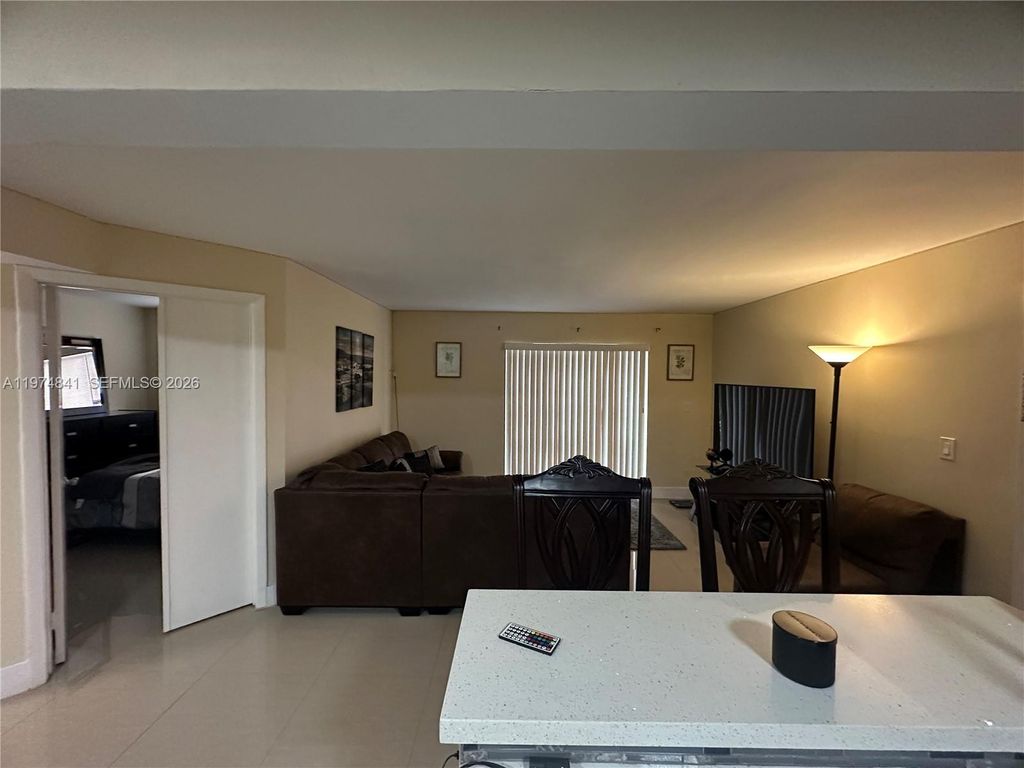 Photo of 9491 S Palm Cir S #202, Pembroke Pines, FL 33025 (MLS # A11974841)