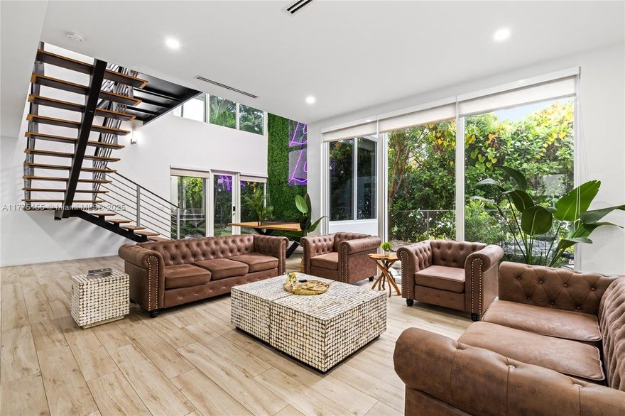 This exceptional 5-bedroom, 5-bathroom modern home, built in 2022, redefines luxury living. With soaring ceilings and a lush tropical backyard featuring a pool, Jacuzzi, and built-in BBQ, every detail is designed for comfort and elegance. Nestled in the highly desirable Silver Bluff neighborhood, it embodies the perfect balance of privacy and proximity to Miami's finest destinations, including Brickell, Coconut Grove, and Calle Ocho. Whether you’re entertaining guests or savoring a quiet evening by the pool, this home provides an inspiring blend of style and sophistication. Experience the harmony of urban convenience and a serene retreat—schedule your private showing today!