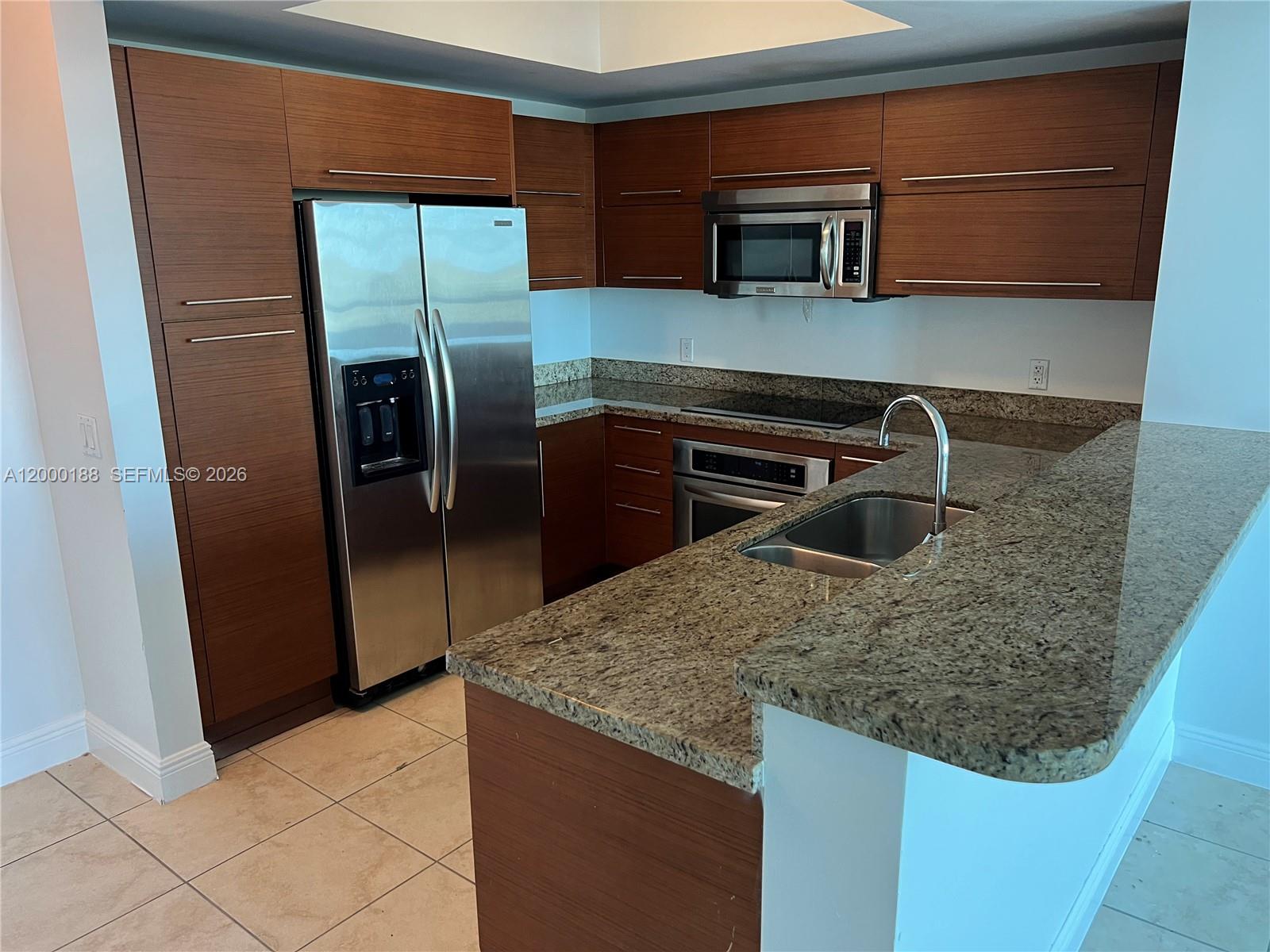 TAO SAWGRASS CONDOMINIUM - Residential Lease