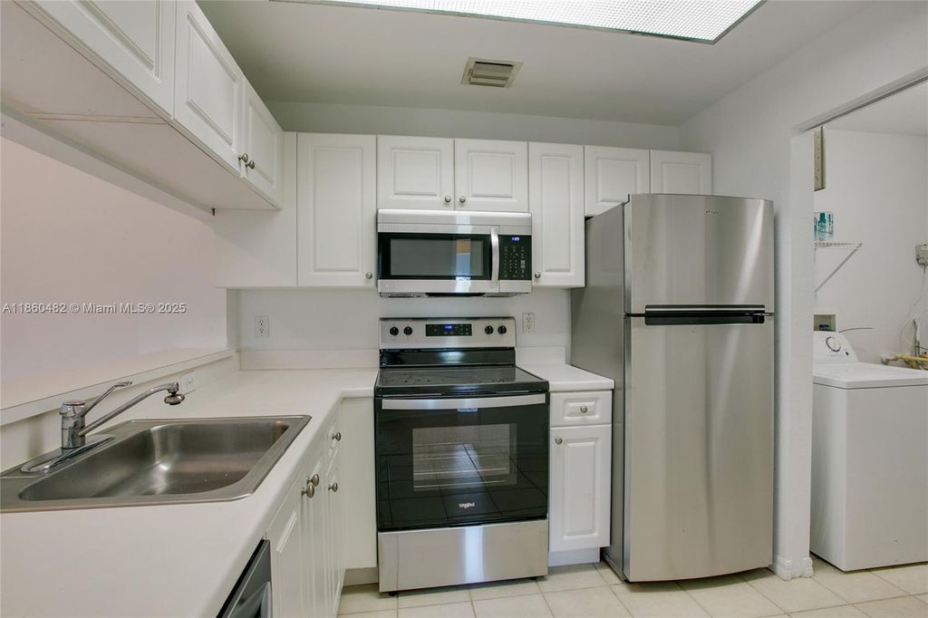 Photo of 2813 Grande Pkwy #301, Palm Beach Gardens, FL 33410 (MLS # A11860482)