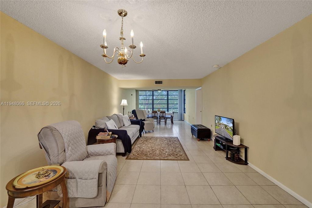Photo of 1713 Whitehall Dr #304, Davie, FL 33324 (MLS # A11948066)