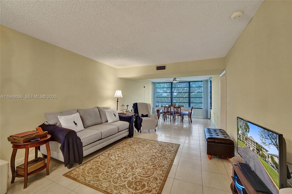 Photo of 1713 Whitehall Dr #304, Davie, FL 33324 (MLS # A11948066)