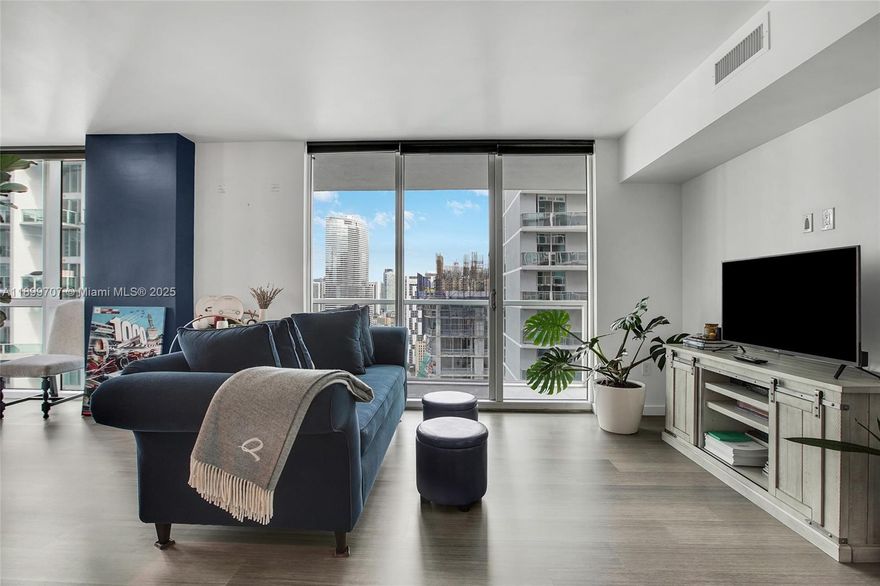 Exquisite furnished corner unit on the 37th floor, bathed in natural light with floor-to-ceiling windows and sweeping views of the Miami River and city skyline. This elegant 2-bedroom, 2-bath home features a split floor plan, waterproof vinyl flooring, and a modern kitchen with quartz countertops and stainless steel appliances.

Located in a premier Brickell building with resort-style amenities including 24-hour concierge and valet, pool, fitness center, sauna, and business center. Steps from Brickell City Centre, world-class dining and shopping, and minutes from the sun-soaked shores of Miami Beach — truly the pinnacle of sophisticated city living