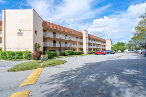 Photo of 2811 N Pine Island Rd #109, Sunrise, FL 33322 (MLS # A12003880)