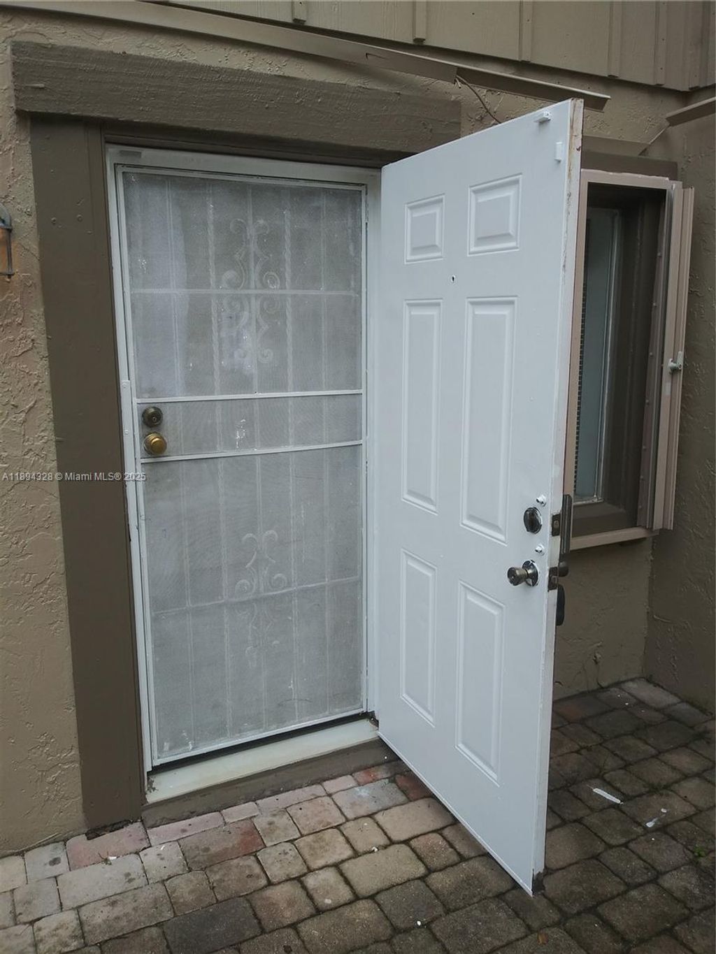 Photo of 2144 NW 57th Ave #14-B, Lauderhill, FL 33313 (MLS # A11894328)