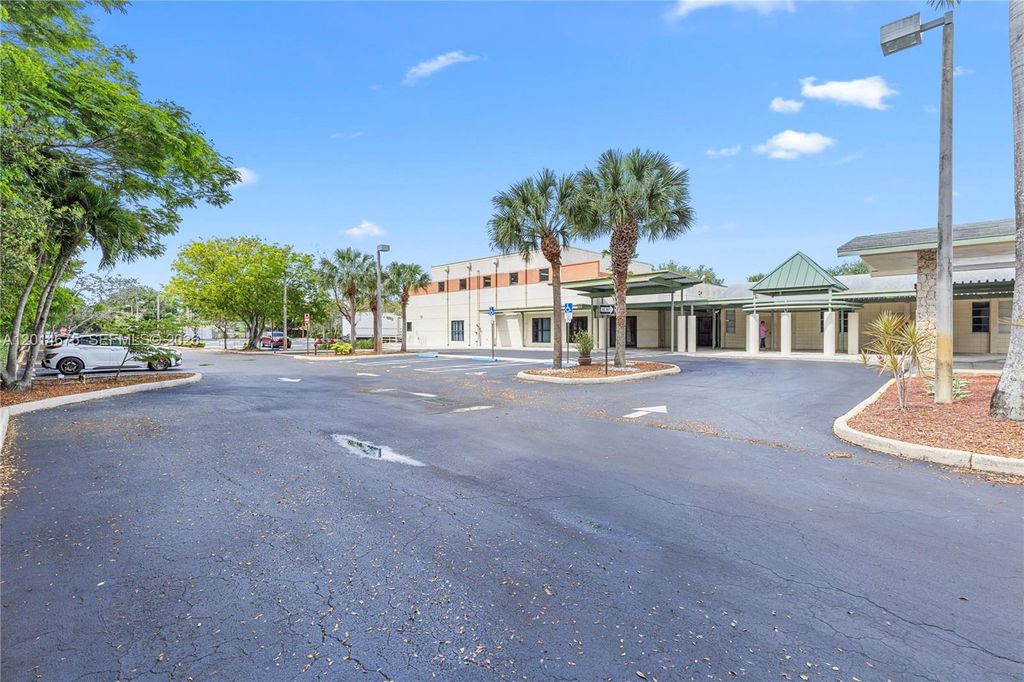 Photo of 8530 Stirling Rd, Davie, FL 33024 (MLS # A12014675)