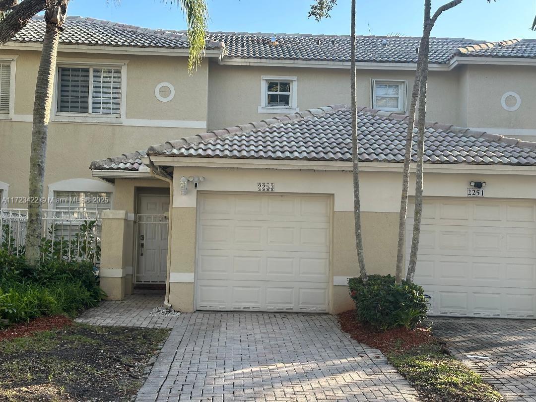 Stunning Townhome in the Prestigious Pembroke Isles Community! This beautifully maintained 2-bedroom, 2.5-bathroom home with a 1-car garage offers the perfect combination of comfort and style. Recent upgrades include a new AC system installed in 2020, a washer added in 2023, and an updated guest bathroom. The 2nd floor features updated flooring, the master bedroom boasts a spacious walk-in closet. The secondary bedroom good size and its own private bath. Outside, the property offers a cemented fenced patio and an updated front porch, perfect for relaxing. This property is move-in ready and ideal for buyers seeking a blend of modern upgrades. Resort-style amenities, including 3 pools, Jacuzzis, tennis and pickleball courts, fitness center, basketball, and two children’s playgrounds.