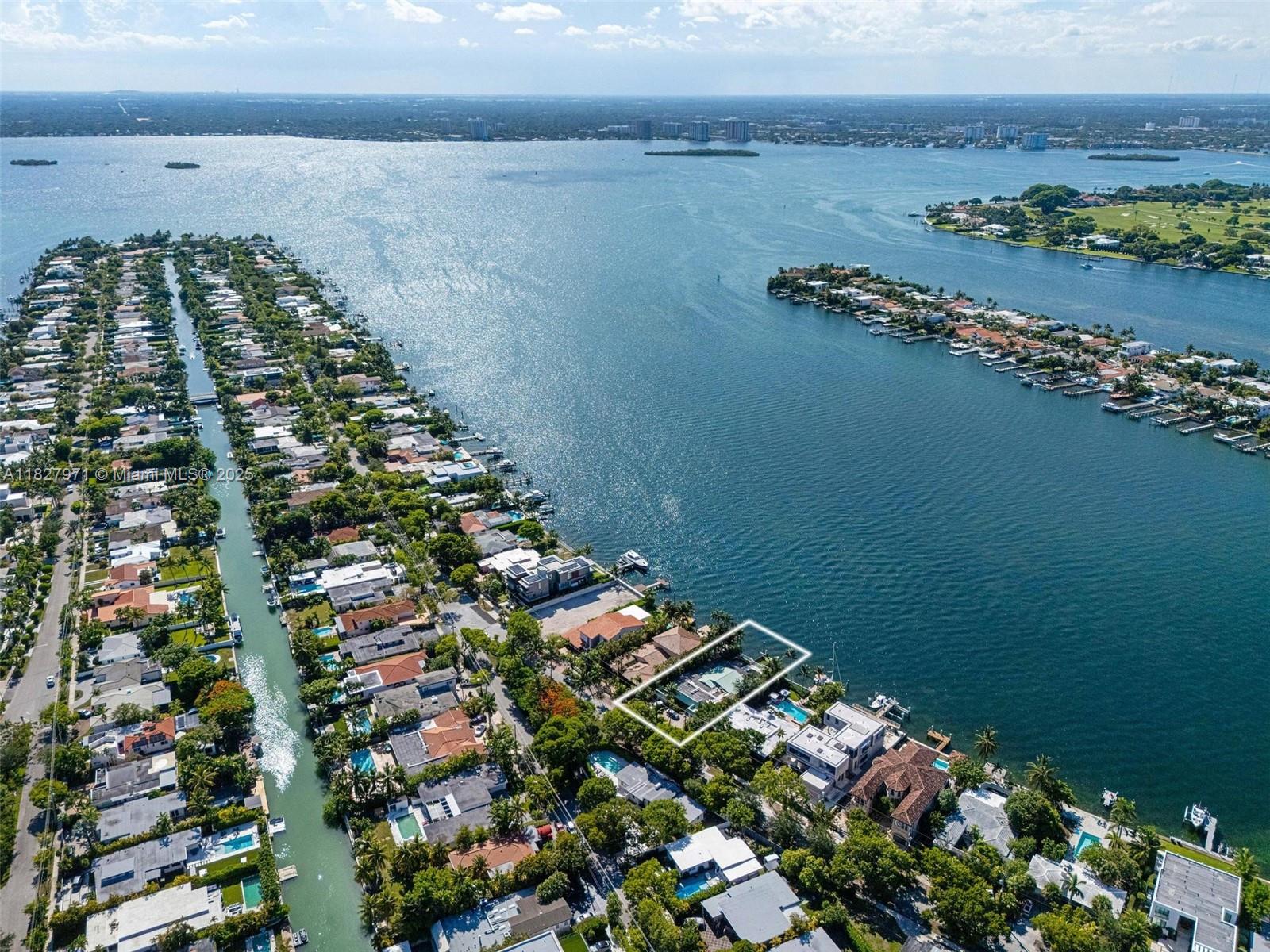Incredible opportunity to acquire this waterfront property priced at lot value on one of Miami Beach’s most exclusive gated islands. This 4BD/3.5BA home, approx. 3,934 SF under AC, sits on an oversized lot with 75 feet of open bay frontage and spectacular views. Ideal for a full remodel or complete redevelopment for the construction of a brand new house —bring architectural vision to life with your own custom masterpiece in a booming area. Just minutes from Bal Harbour, world-class beaches, dining & shopping. Rare chance to secure prime bay-front real estate at land-only pricing. Easy to show.