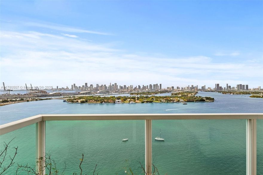 Premier corner line at The Floridian with a wraparound balcony and stunning views of Biscayne Bay, Star and Palm Islands, and the Downtown Miami skyline. This spacious 2-bedroom, 2-bath residence features a split floor plan, marble floors, an open kitchen with stainless steel appliances, updated closets, and an in-unit washer and dryer. Includes assigned garage parking. The Floridian offers resort-style amenities including two bayfront pools, a fitness center, hot tub, tennis court, 24-hour security, concierge, and valet service.