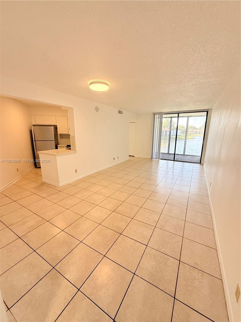 Photo of 210 Lake Pointe Dr #210, Oakland Park, FL 33309 (MLS # A11953096)