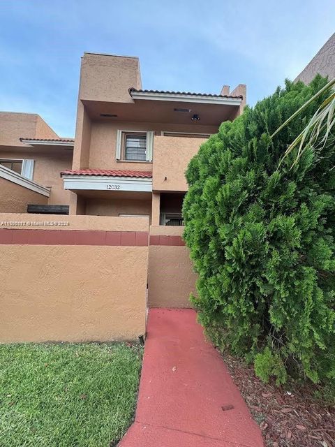 Photo of 12032 S Las Palmas Dr, Pembroke Pines, FL 33025 (MLS # A11886011)