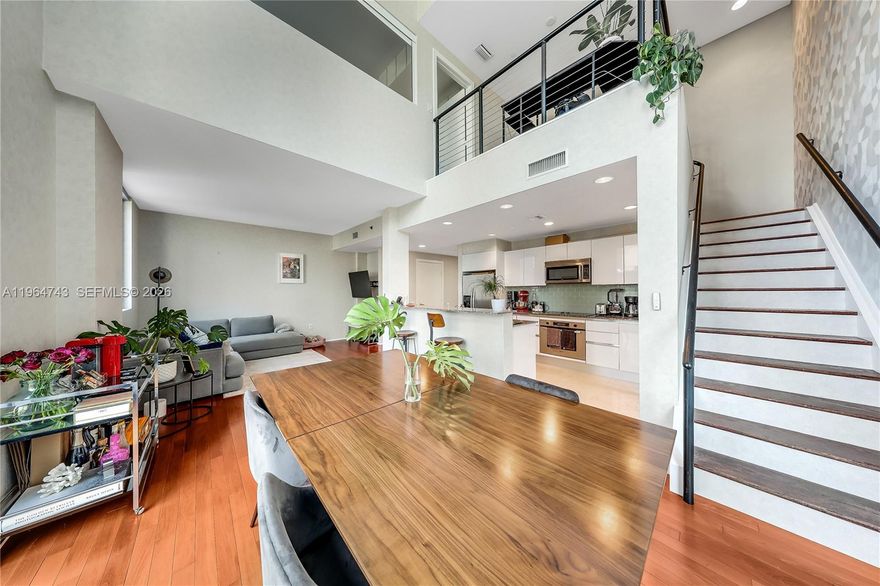 Fully upgraded two-story corner loft at 1050 Brickell. Residence #422 features soaring ceilings, floor-to-ceiling windows, and open views of South Miami Avenue. The upstairs bedroom has been fully enclosed for added privacy while maintaining the modern loft design. Bright corner exposure provides abundant natural light throughout. Rare same-floor parking allows for quick and convenient access without elevator use. Located in the heart of Brickell, just steps from Brickell City Centre, Mary Brickell Village, top dining, shopping, and the financial district. Move-in ready and perfectly positioned for true urban living.