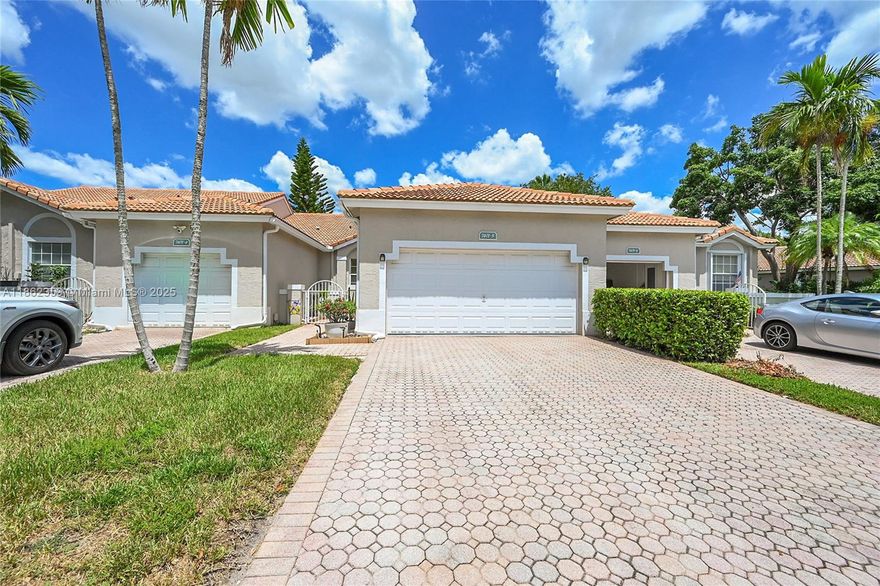 Welcome to the lowest priced 2 car garage home in Sunrise.  This bright and inviting 2-bedroom, 2-bathroom home featuring an open floor plan and abundant natural light. The spacious living area flows seamlessly into the kitchen with fresh white cabinets, stainless steel appliances, and a convenient breakfast bar. This is a smart home with neutral paint colors that create a clean canvas for your decorative finishes. The split-bedroom layout offers privacy, with a comfortable primary suite that includes ample closet space and sliding glass doors leading to the patio. Both bathrooms are well maintained and designed for everyday comfort. Located in a desirable area close to top-rated schools, shopping, dining, parks, and major highways, this home combines lifestyle and convenience. Perfect for buyers or investors seeking long-term value. Seller is motivated and ready to sell!!!