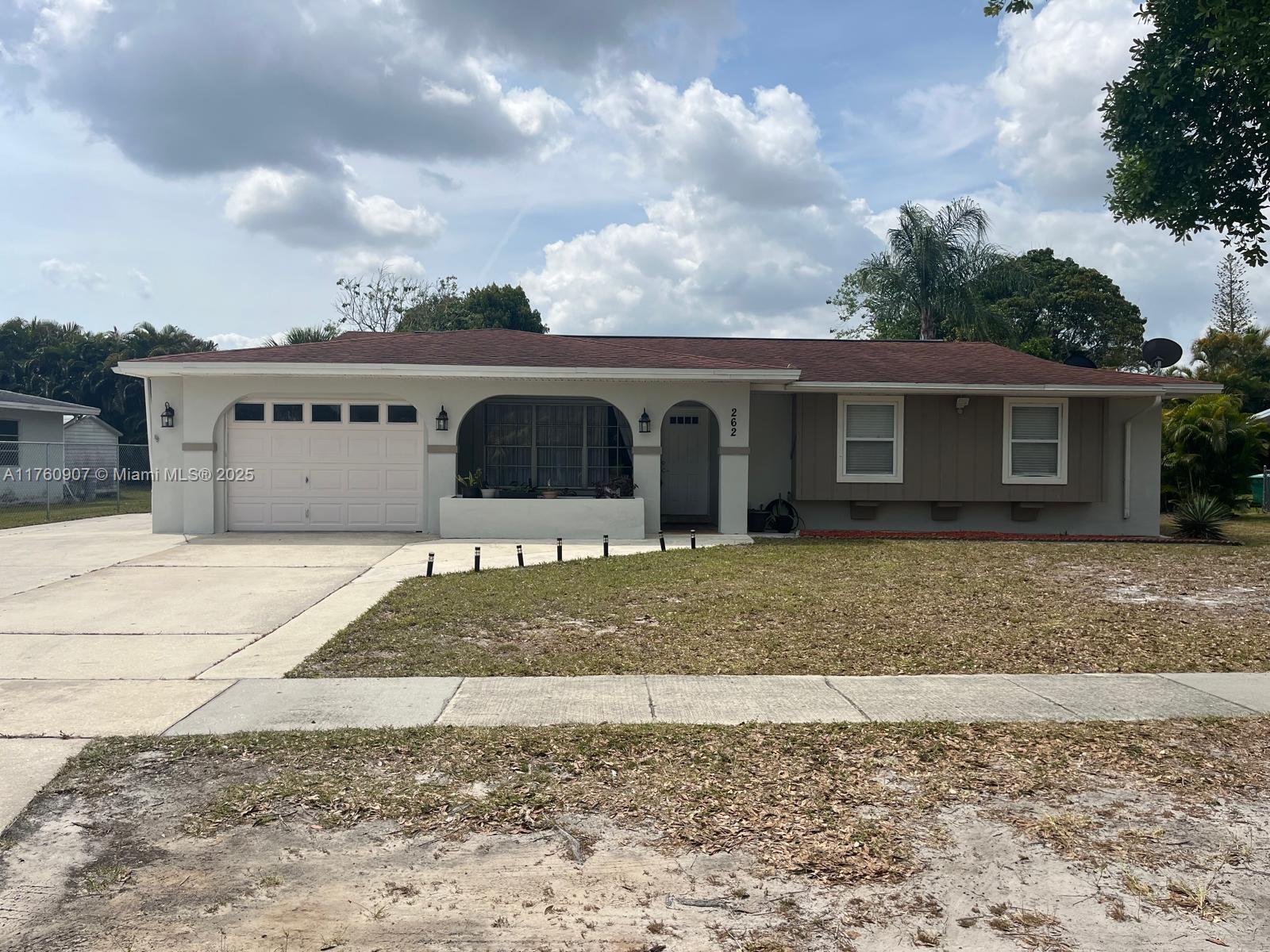 Charming move-in ready 3 bedroom, 2 bathroom home. Updated kitchen and bathrooms. Ceiling fans in all bedrooms. Spacious backyard with a Mango tree. Washer and Dryer in good condition. Roof installed in 2014.