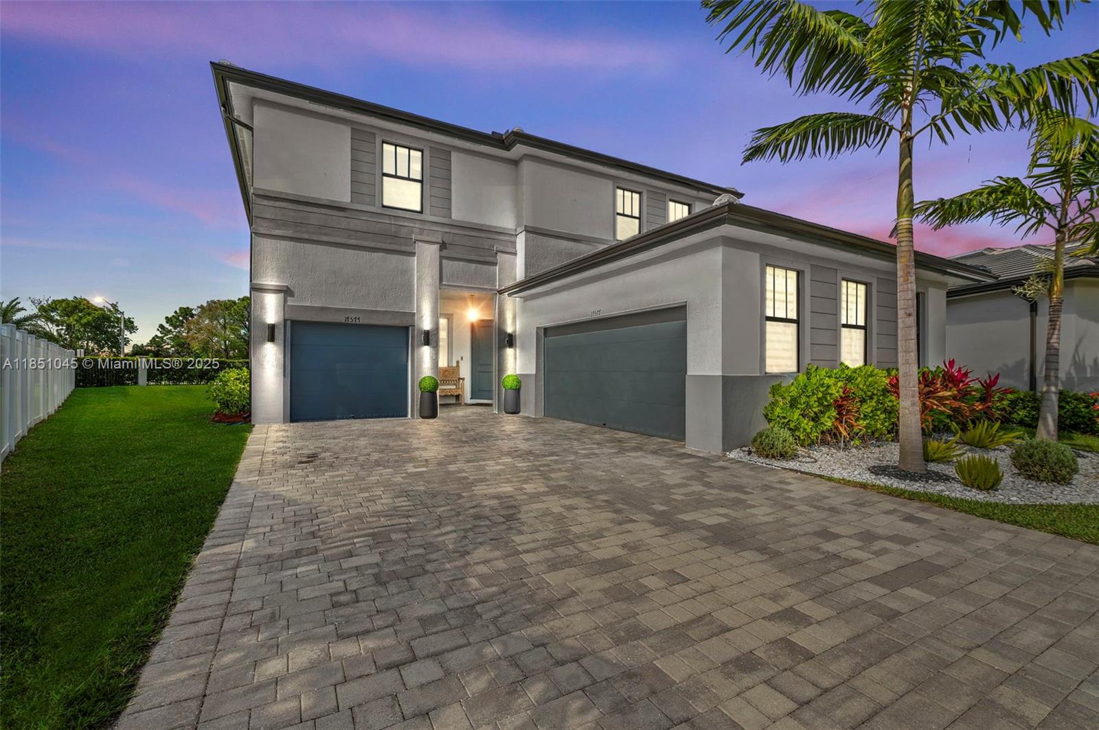Discover luxury in this 5-bedroom home on an oversized pie-shaped lot in Marbella, Miramar. Features include a contemporary open-concept kitchen with stainless steel appliances and island, plus a first-floor primary suite for ultimate convenience. Upstairs offers a large loft, laundry room, and spacious bedrooms, including a grand primary suite with double closets and a spa-like bath. A two-car garage and an additional single-car garage both with pristine epoxy flooring provide the ideal space for a workshop or bespoke mancave. Enhanced with new hurricane impact windows exceeding code for ultimate protection. Enjoy exclusive access to resort-style amenities, including a clubhouse, pool, and state-of-the-art fitness center. Surrounded by top-rated schools, fine dining, and major highways.