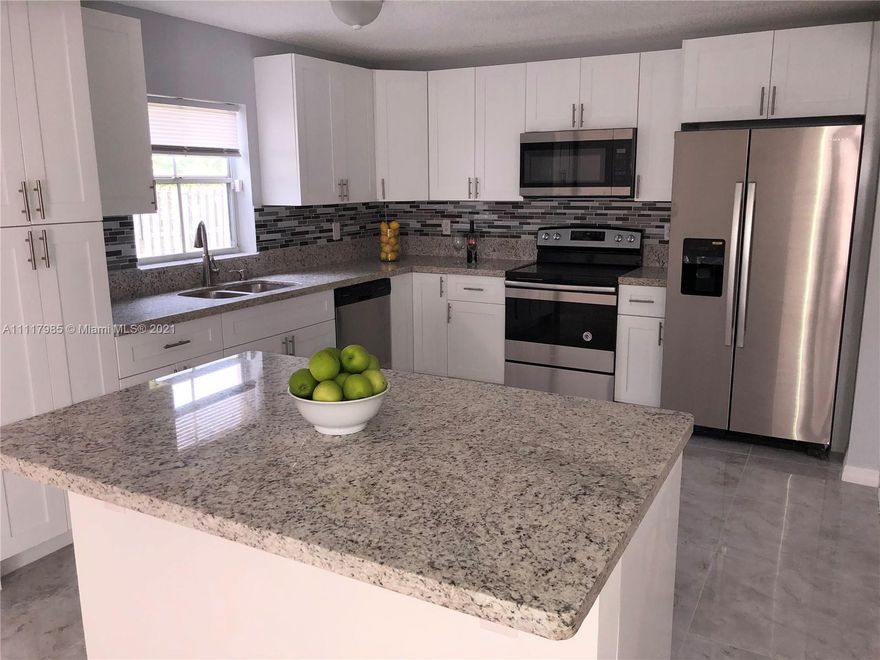 RARE JEM IS AVAILABLE IN THE EXQUISITE BANYAN ESTATES. HOME BOASTS OVER TWO THOUSAND SQ FT 4 BEDROOMS + A BONUS ROOM THAT CAN BE USED AS A FIFTH BEDROOM, OFFICE, OR DINING. BEAUTIFUL KITCHEN FEATURING WHITE CABINETS, PORCELAIN TILES, STAINLESS STEEL APPLIANCES, AND GRANITE COUNTERTOPS. SECURITY CAMERAS ARE ALREADY INSTALLED AND OPERATIONAL FOR THE NEW HOMEOWNERS. HOUSE IS  CONVENIENTLY LOCATED ON THE LAST STREET IN THE COMMUNITY, THEREFORE THERE ARE NO HOMES IN FRONT. THIS CERTAINLY WILL NOT LAST SO PLEASE COME AND SEE TO REALLY APPRECIATE.