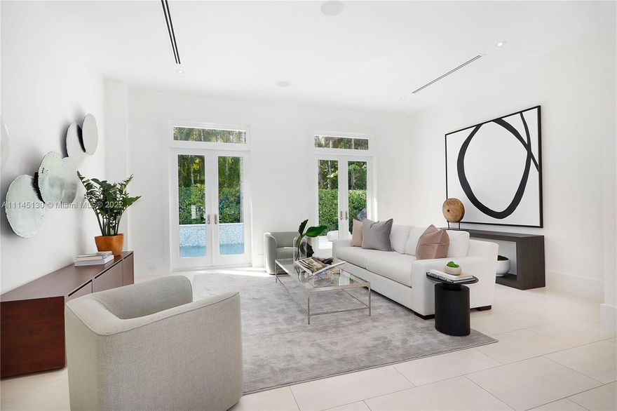 Modern Construction (2015) in N.Coconut Grove w/Guest House on a 15,624 SF Lot!Tucked away at the end of a quiet cul-de-sac is a magnificent private, gated 5 /6 retreat (4/5 Main House and 1/1 Guest House), surrounded by lush tropical landscape, heated saltwater pool & putting green.Professionally designed, this stunning home’s floor plan is enhanced by its high ceilings & natural light that flows throughout.Features include: Gourmet Kitch by Snaidero, Sub-Zero, Wolf & Miele appl, Quartz & Marble Countertops, Custom Built Closets, Built-in Speakers, Security Cameras, Kohler Full House Generator (natural gas),Hurricane Impt Windows/Doors, & high-end finishes throughout.Flood Zone X!Incredible location:close to Kennedy Park, Ransom Everglades MS, restaurants, shops, yacht clubs, Biscayne Bay