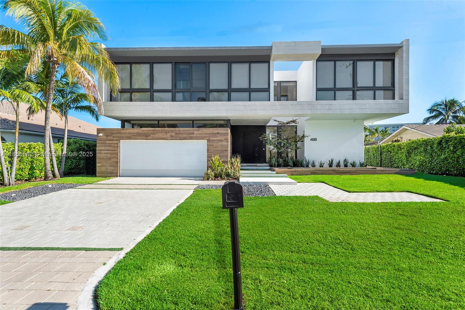 Introducing Sunset Mansion in the guard-gated Golden Isles enclave—your ultra-modern waterfront masterpiece. Built in 2019–2020, this 2-story estate spans 5,793sqft of luxe living on a 12,750sqft lot. With 6 bedrooms, 6 full baths + 1 half bath, it boasts soaring 24-ft ceilings, a private elevator, chef’s kitchen with wine fridge, skylight roof, marble finishes, and a private pool with jacuzzi. Enjoy 85 ft of yacht-friendly frontage and direct bay/ocean access—perfect sunsets guaranteed. Flexible stays welcome: short-term, weekly, monthly, or yearly. Call listing agent for exclusive showings.