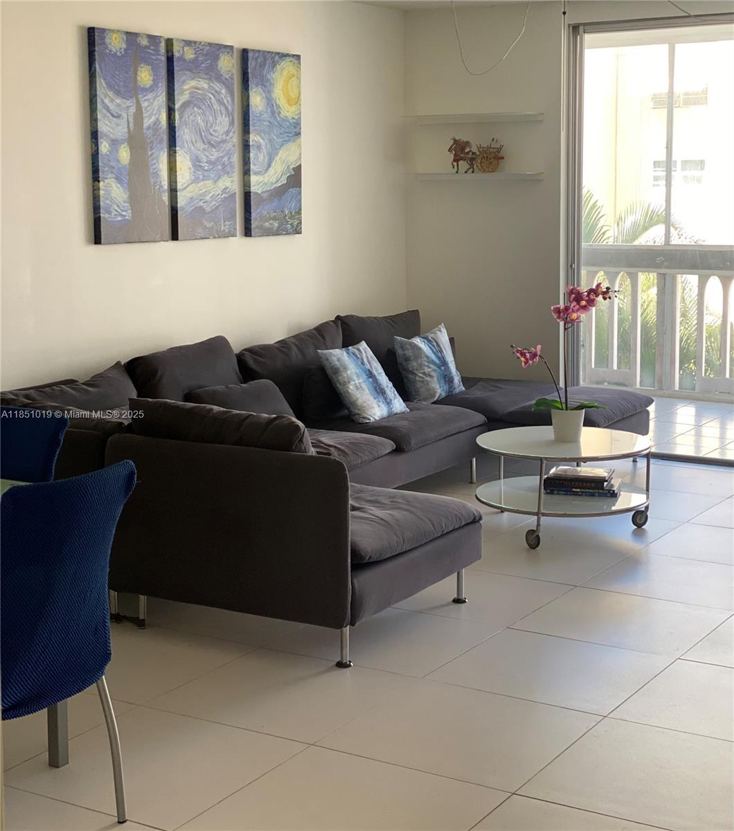 Very bright and large apartment at the Meadowbrook Condo. It is 2 bedrooms, 2 bathrooms plus den. The unit has a new tile floor throughout. The balcony is converted to a large patio that can be used as an extra space for an office or room. The bedroom has large walk in closet. There is an extra personal storage and laundry room on every floor within close range of the unit. The community allows only 55 and older members. Water is included in monthly maintenance fees. There is also a heated pool, sauna, small gym and club house. Short distance to shops, restaurants and short distance to beautiful Hallandale beaches.